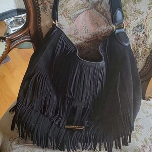 Calvin Klein black "leather" fringed shoulder bag preowned good cond inside out.